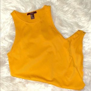 Mustard colored onesie shirt